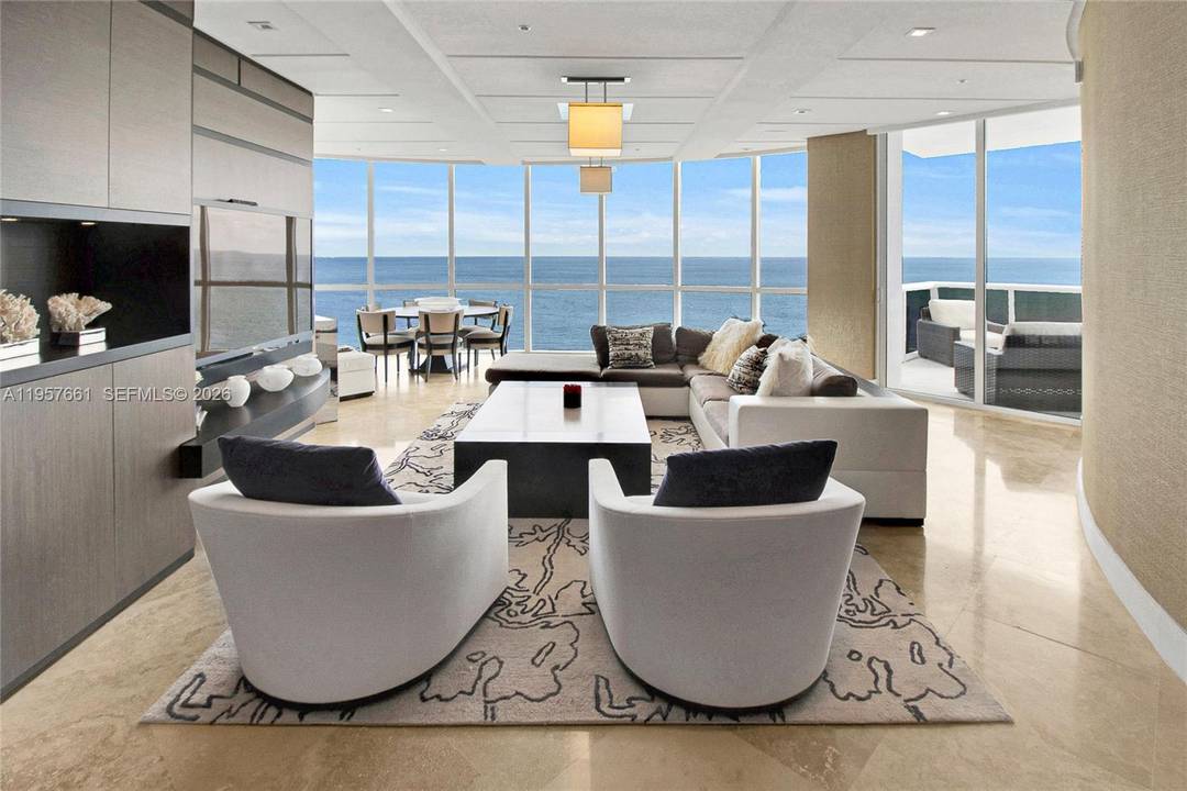 Offered for the first time since new, this luxurious Trump Palace Sky Home showcases impeccable professional design by renowned designer Fanny Haim, with no expense spared.