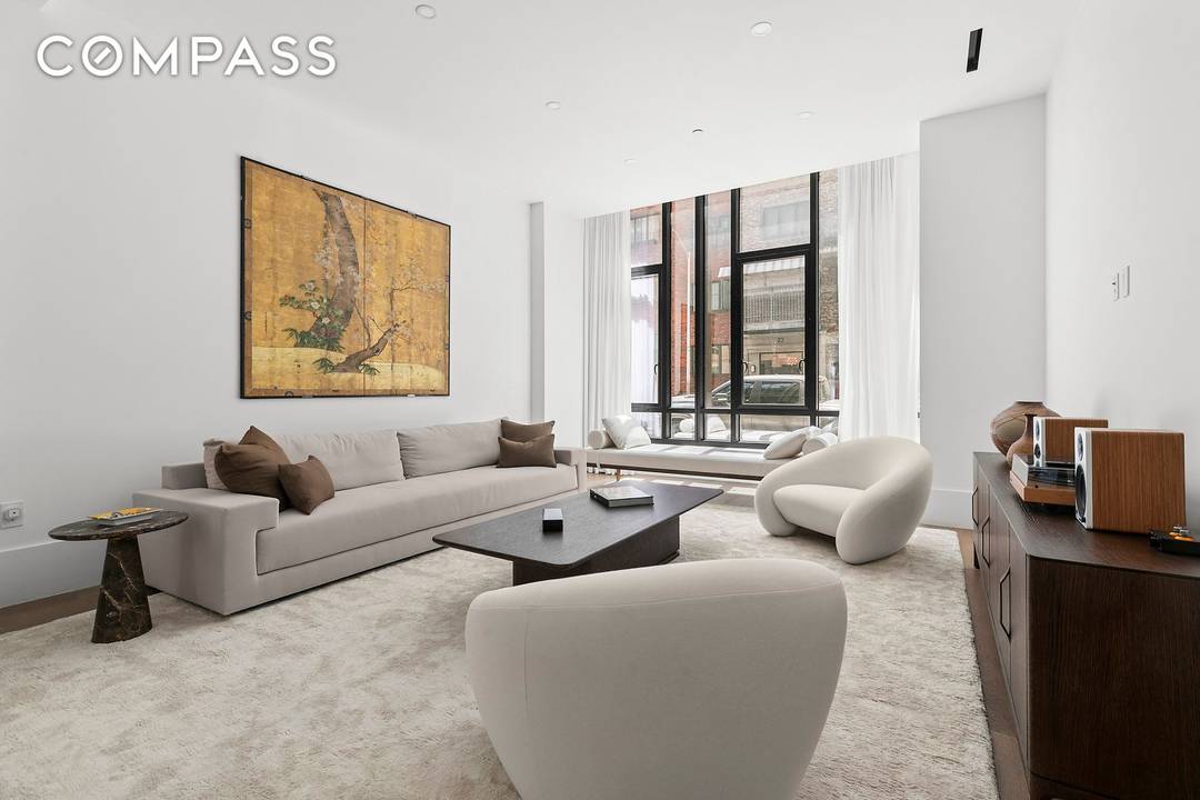 The Ultimate 4 Bed Townhouse style Condo Private Garage, Backyard and Entrance on the Williamsburg Waterfront.