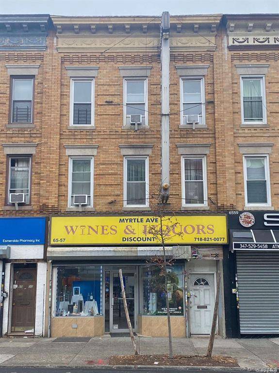 Mixed Used Property with 2 Residential Units plus 1 store front for Sale.