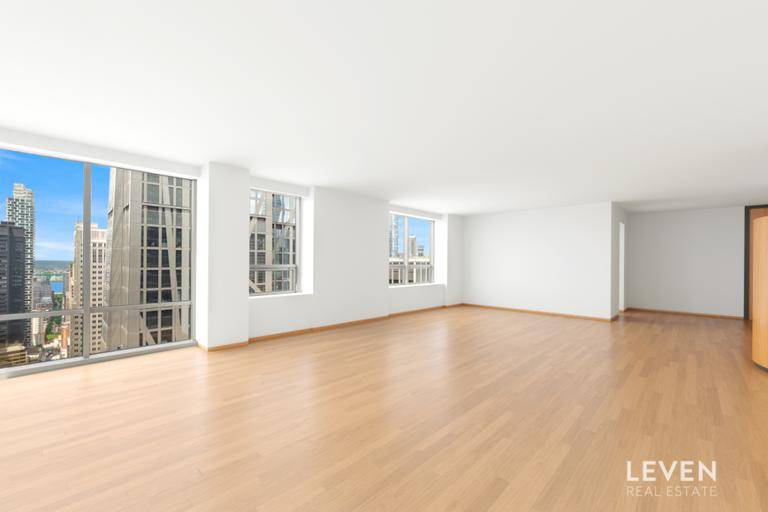 OPEN HOUSES ARE BY APPOINTMENT ELEGANT HIGH FLOOR CORNER RESIDENCE WITH HOME OFFICE, ATOP MoMAStep into a world of elegance and sophistication in this stunning corner unit at Museum Tower ...