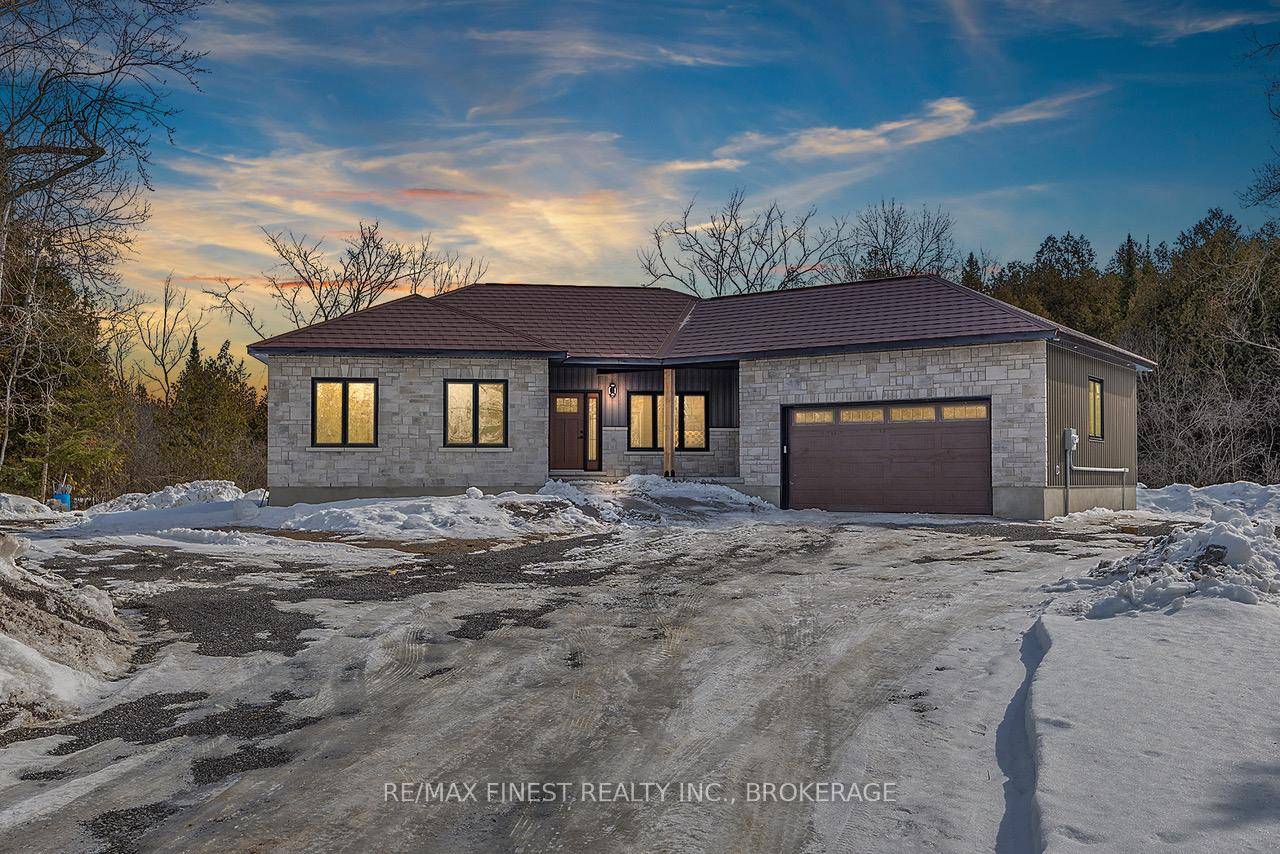 A spectacular new 5 bedroom 4 bath home in a private rural setting, just minutes from the west end of Kingston.