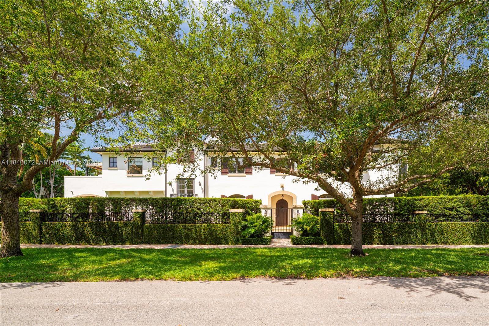 Set on one of South Coral Gables most prestigious streets, this 2015 estate embodies modern elegance and effortless living.