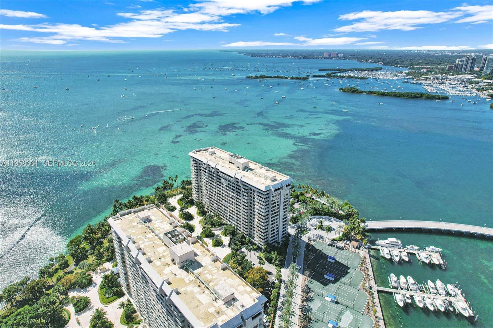 An exceptional opportunity to own a premier corner residence in Grove Isle Building One, located at 1 Grove Isle in the heart of Coconut Grove.