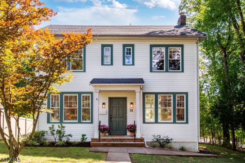 Light, space, and flexibility define this inviting colonial on a lovely tree lined street.