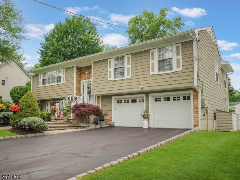 Immaculate move in ready custom home with over 3500sqft of living space situated on a quiet street in North Caldwell.