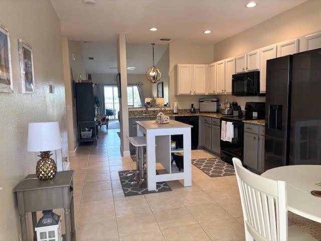 Welcome home to the sought after Gator Trace Golf and Country Club.