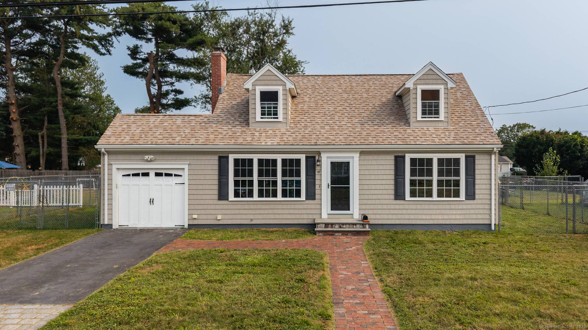 Charming Cape in Desirable Woodmont Area !