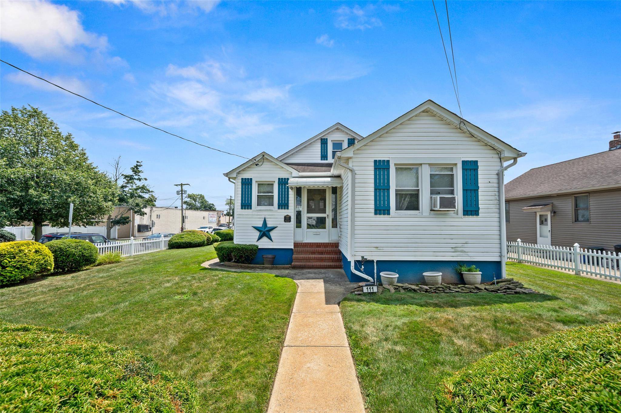 Welcome to this delightful and well maintained home sitting proudly on a spacious corner lot with a white picket fence and manicured landscaping.
