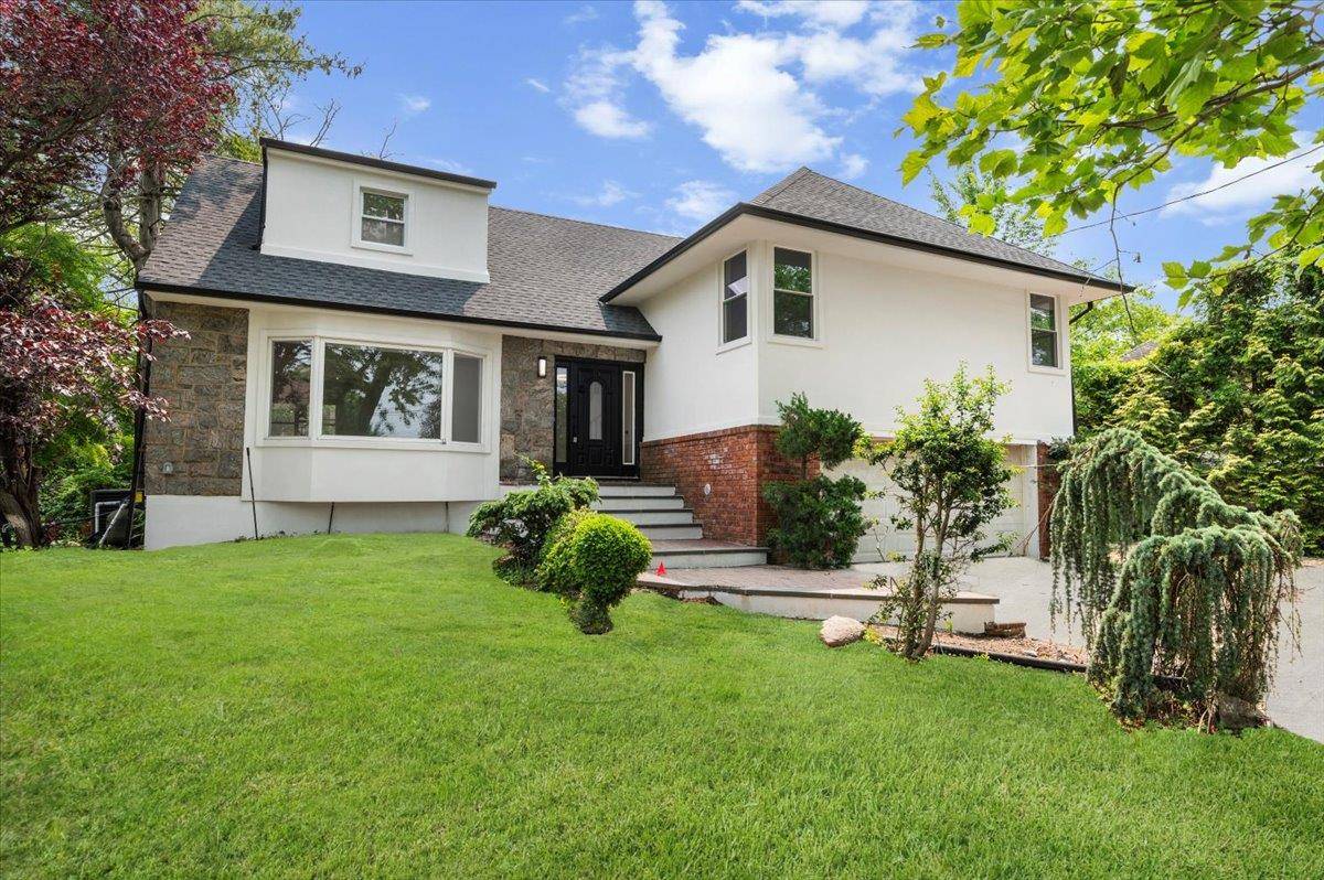 Welcome to this Stunningly Renovated 5 Bedroom 3.