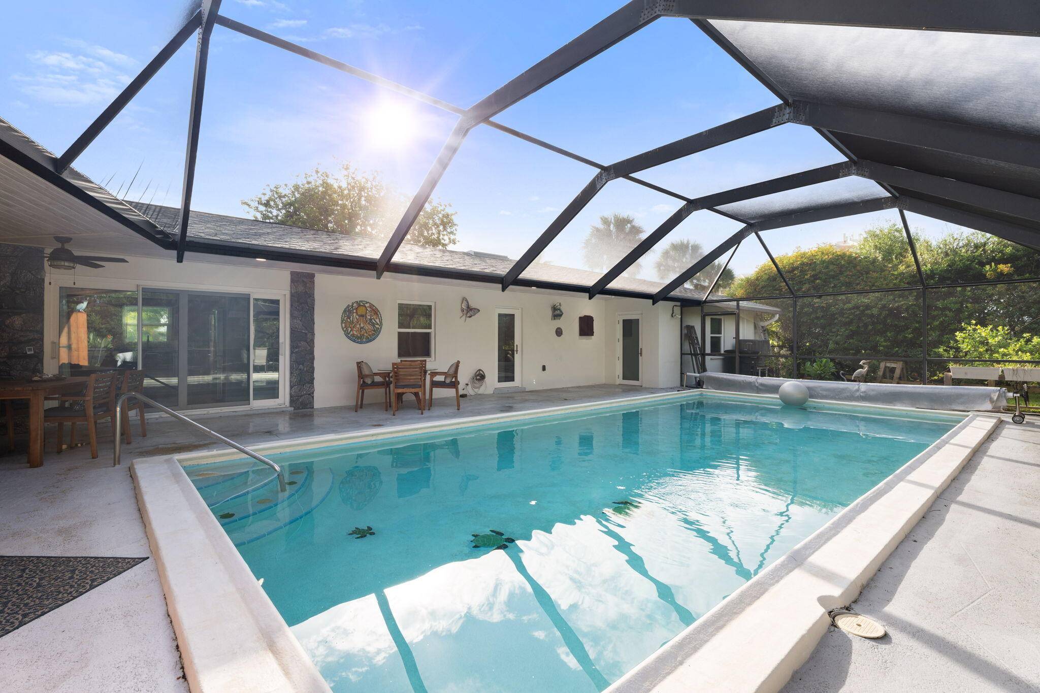 Beautifully updated corner lot home with a 2 car garage, driveway, and partial U shaped drive offering plenty of space for an RV, boat, and more.