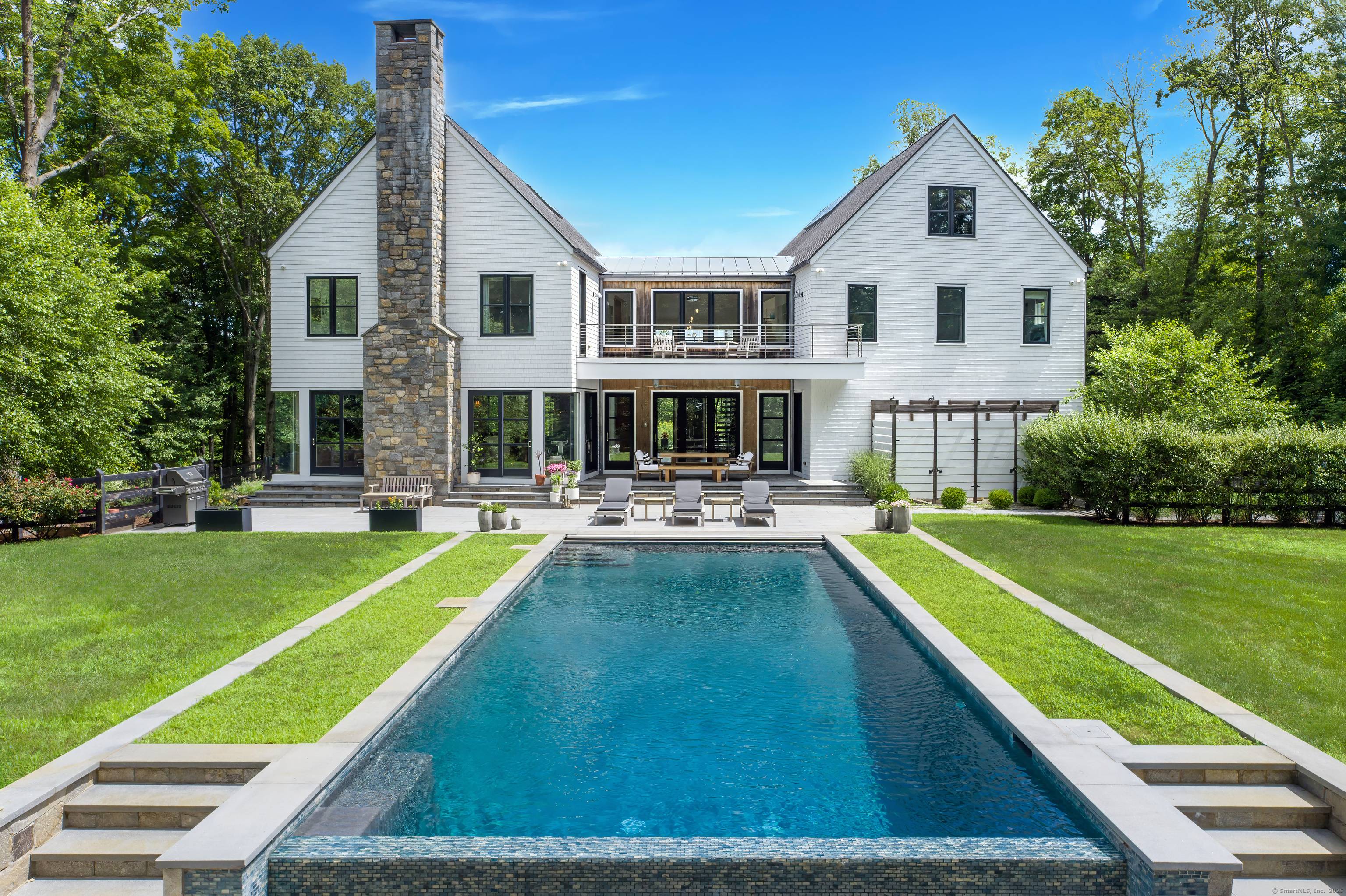 Exceptional custom built home by top tier builder Fletcher Custom Homes and designed by acclaimed architect Chris Pagliaro with interiors by Mark Finley.