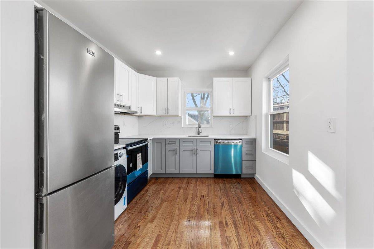 Newly Renovated 2 Family with Walk out Basement.