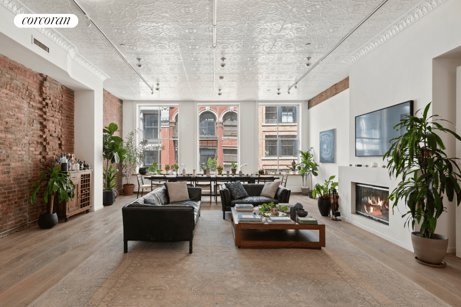 The perfect modern showplace set within historic cast iron bones, this sprawling two bedroom, two and a half bathroom, floor through loft is the epitome of ideal Tribeca living.