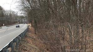 One of a kind approved commercial lot on Route 66 in Marlborough that meets Town minimum requirements for drive thru.