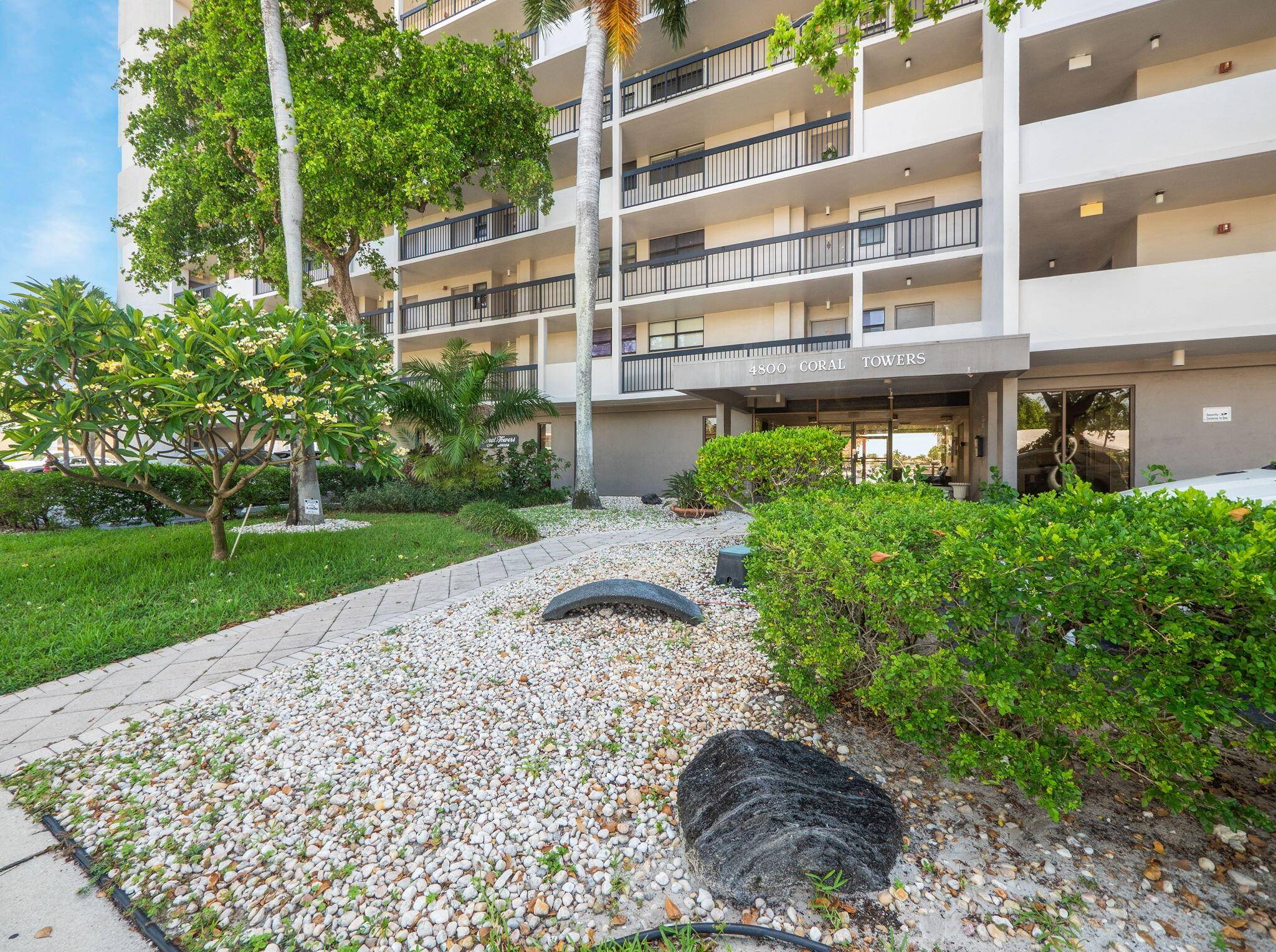 Welcome to this bright and spacious 2 bedroom, 2 bath corner unit in the highly sought after Coral Ridge Country Club.