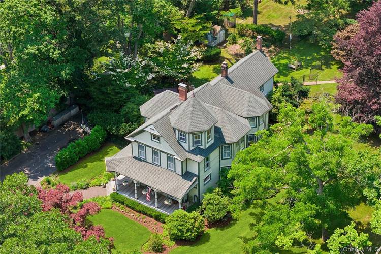 Discover 60 Union Avenue, a beautifully maintained Victorian residence offering timeless elegance and true waterfront living in the desirable estate section south of the highway.