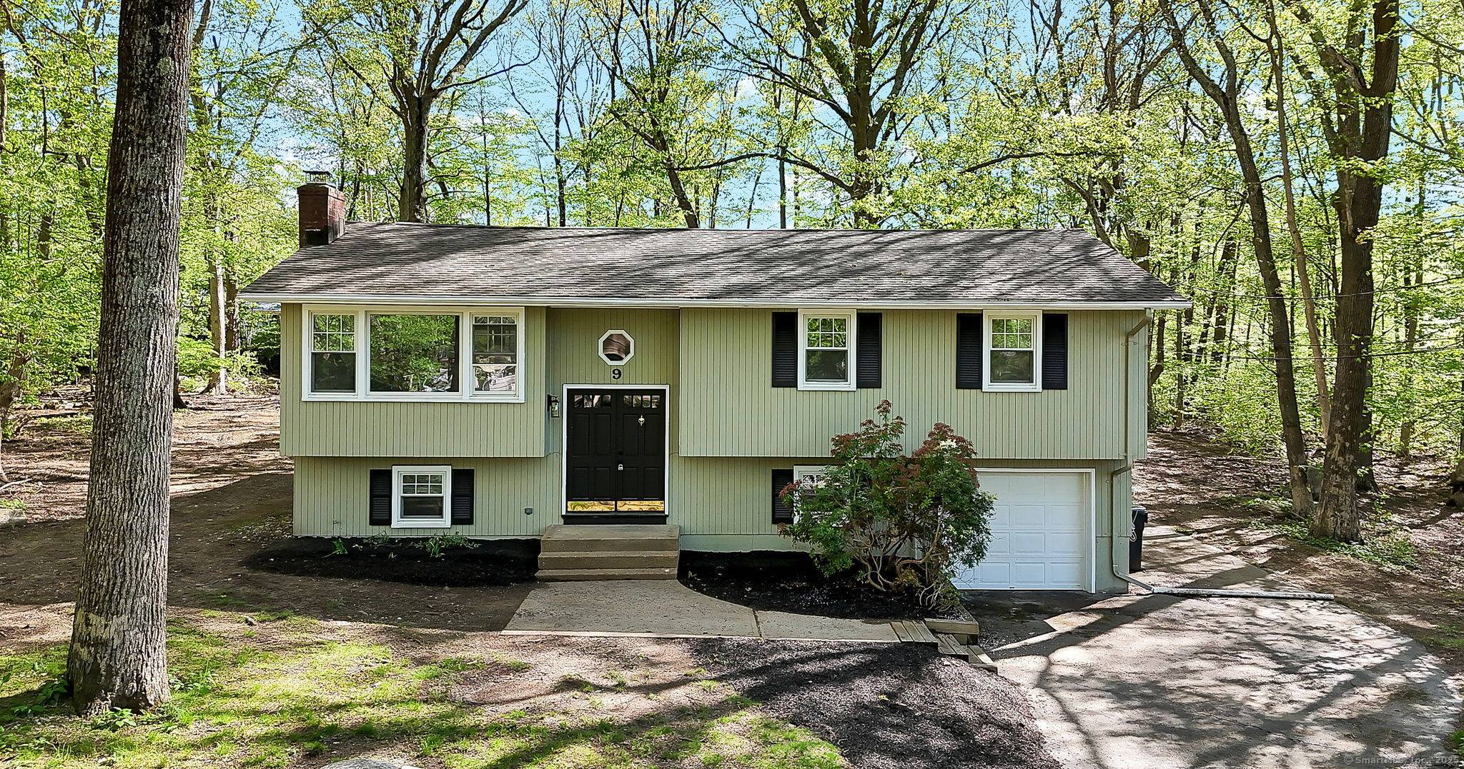 Welcome to 9 West Drive a spacious and inviting 4 bedroom, 1.