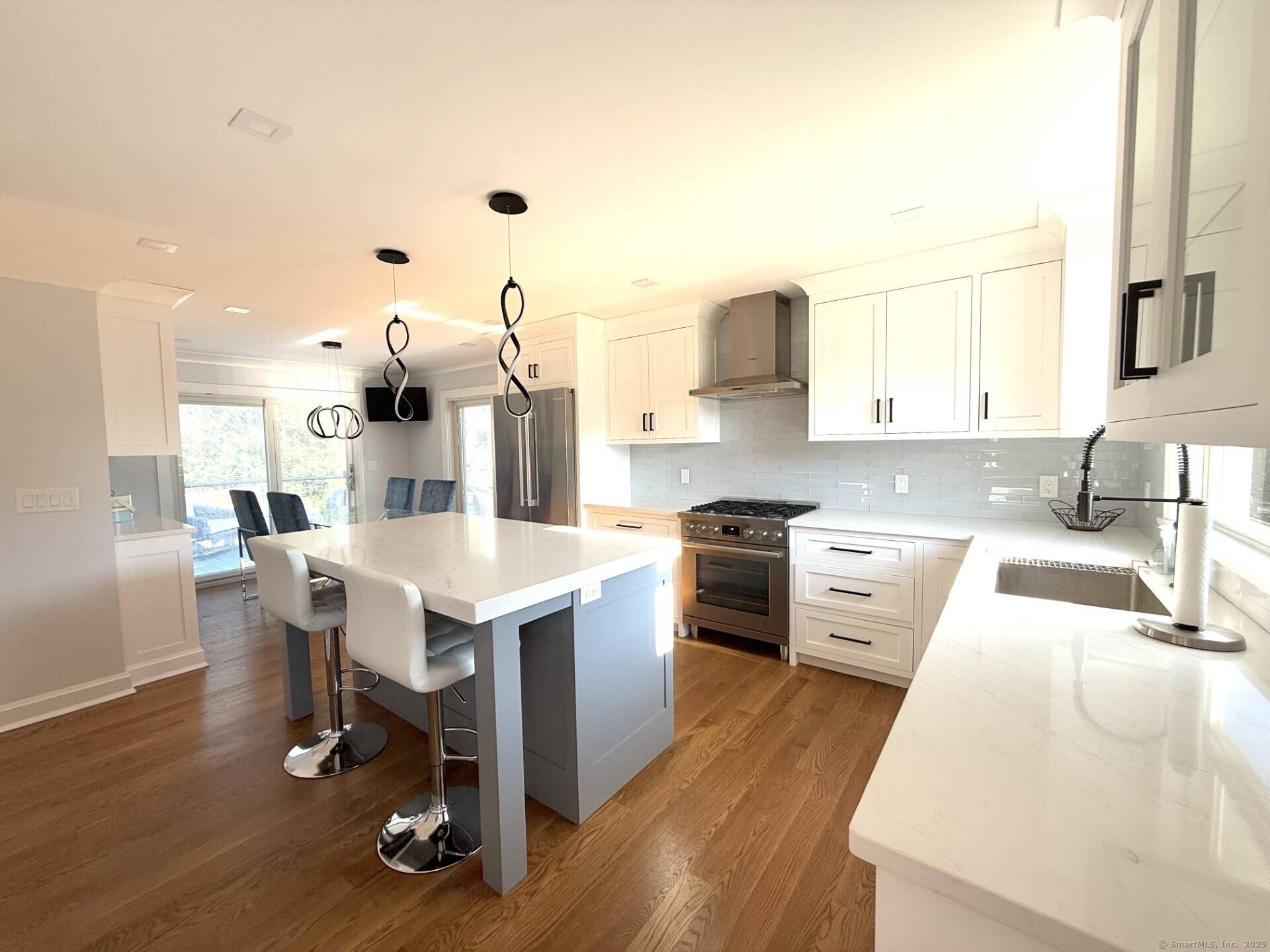 Move in Just in Time to Enjoy Walking to Sandy Beaches, playing in the park and walking to the Center of Town from this completely renovated 3 Bedroom, 2 Full ...