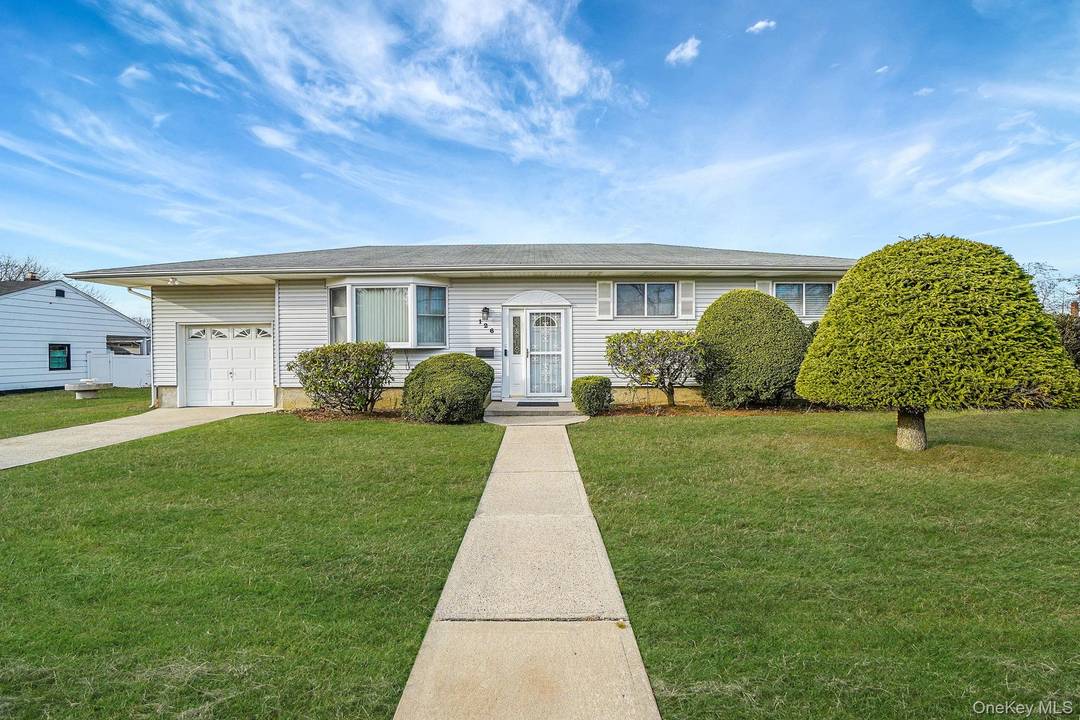 Charming Ranch on a Corner Property Step into this beautifully maintained 3 bedroom ranch featuring hardwood floors covered, brand new bathrooms, and a bright open layout.