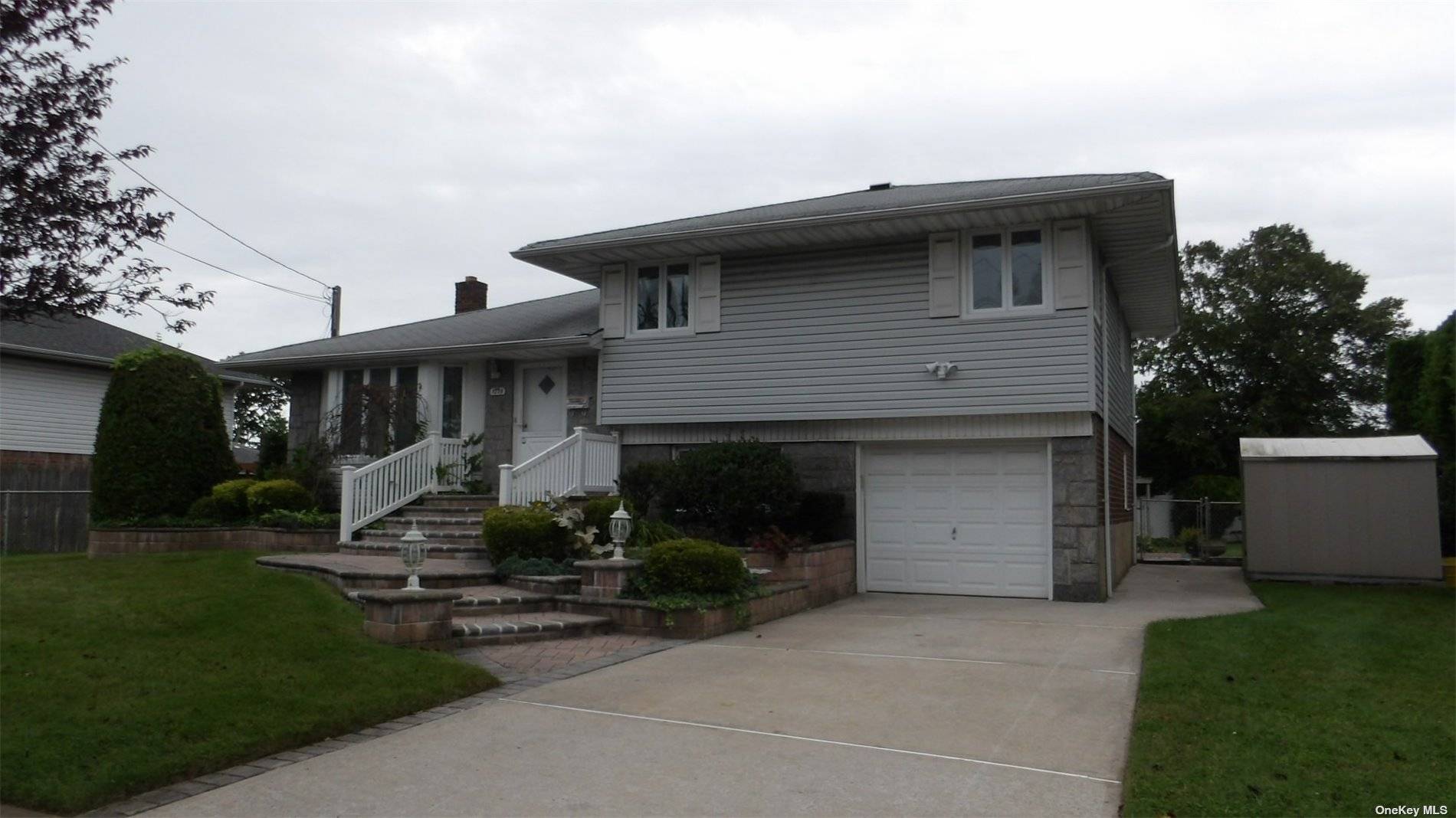 SPACIOUS 4 LEVEL SPLIT WITH PARK LIKE YARD AND FINSHED BASEMENT !