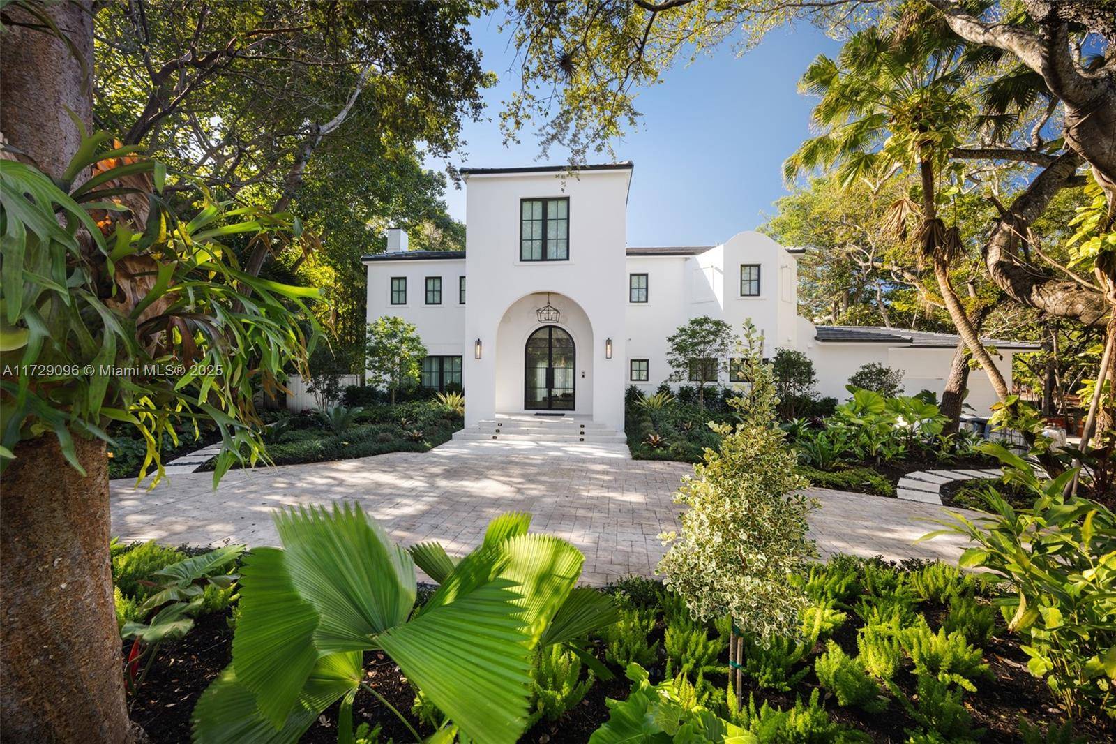 Discover this stunning two story home in the prestigious Hammock Lakes gated community.