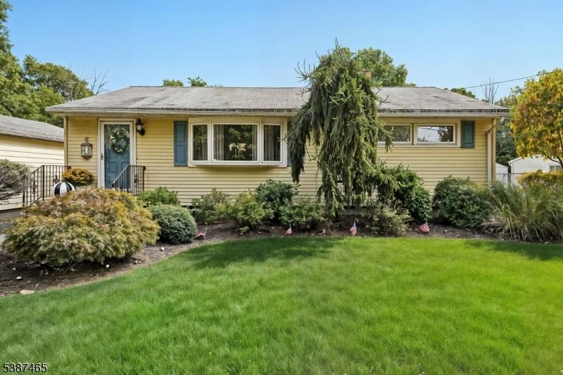 Don't miss this updated ranch on a large lot in desirable Parsippany !