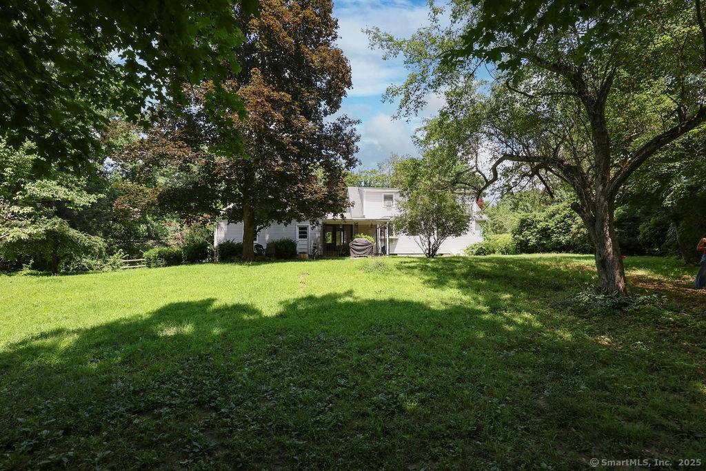 Opportunity knocks at 5 Hickory Hill Road bring your style and imagination to this spacious home tucked away on a quiet street in one of Simsbury's most convenient neighborhoods.