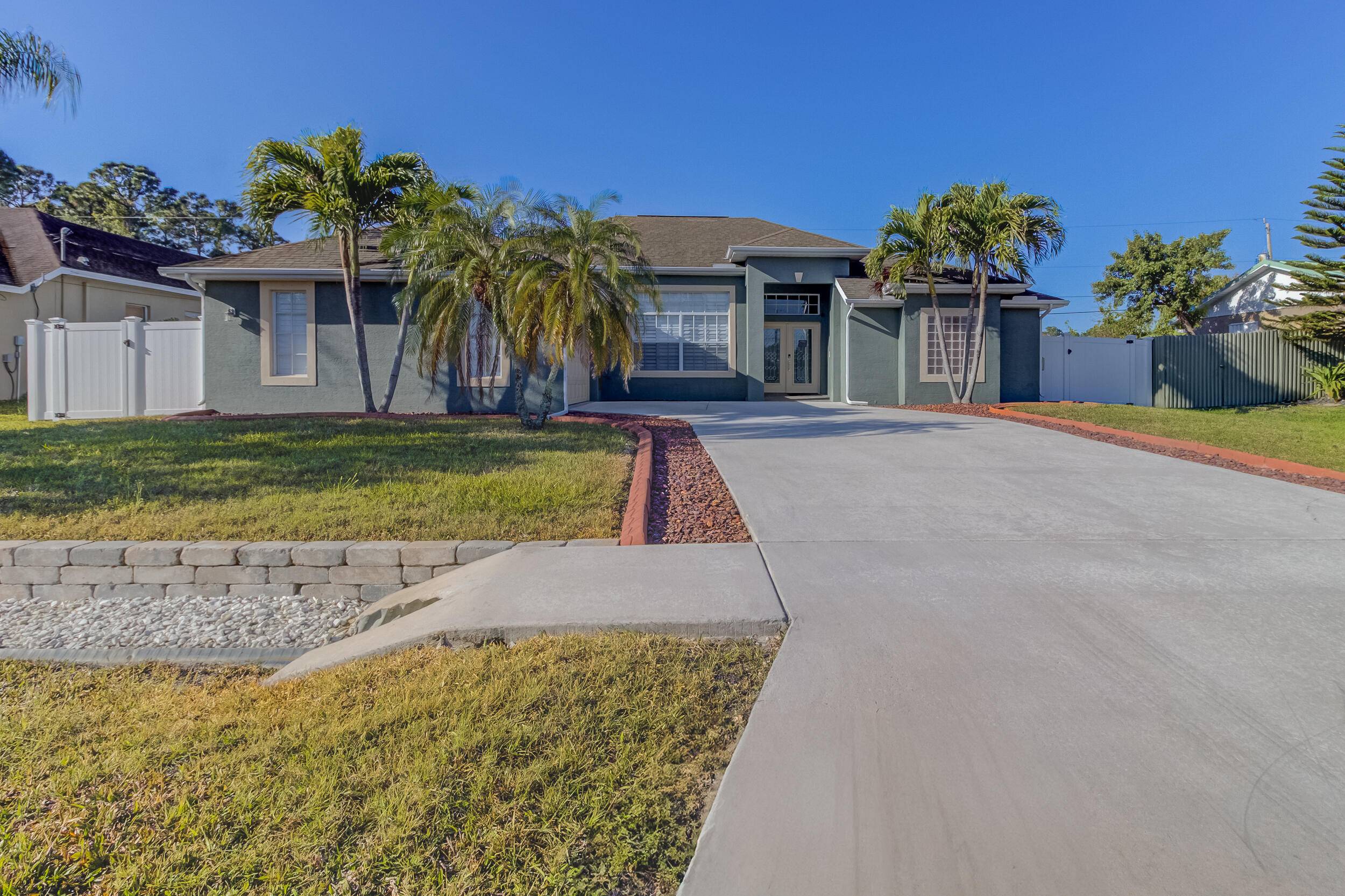 Welcome to this beautiful 4 bedroom, 2 bathroom pool home perfectly situated near Gatlin Blvd.