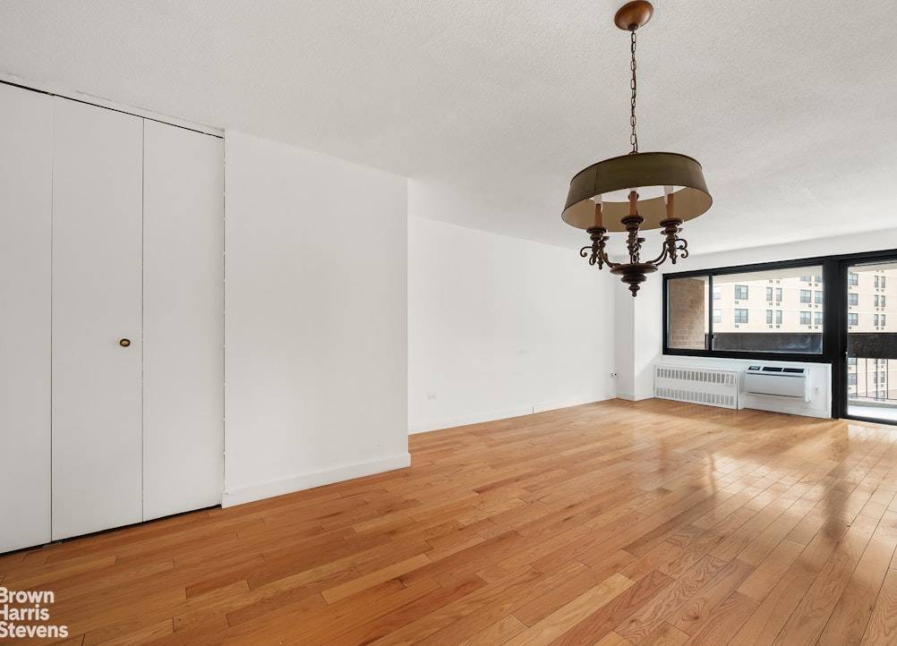 Renovated, south facing one bedroom with tranquil courtyard, river, and skyline views.