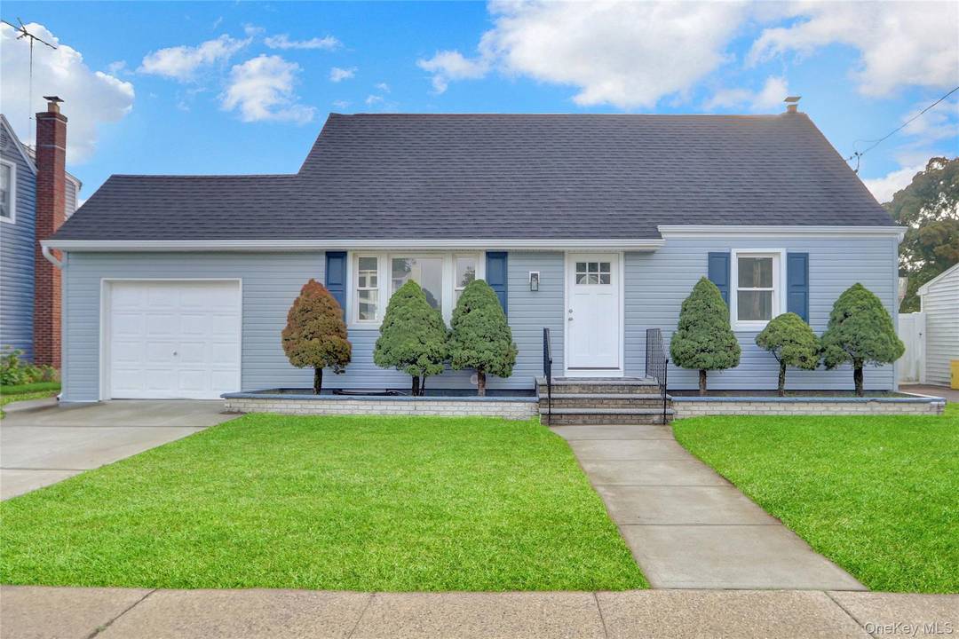 Move right into this 4 bedroom, 2 Bathroom, Cape style home, with roofed over deck, full basement, 1 car garage, updated kitchen w quartz counter and stainless steel appliances, updated ...
