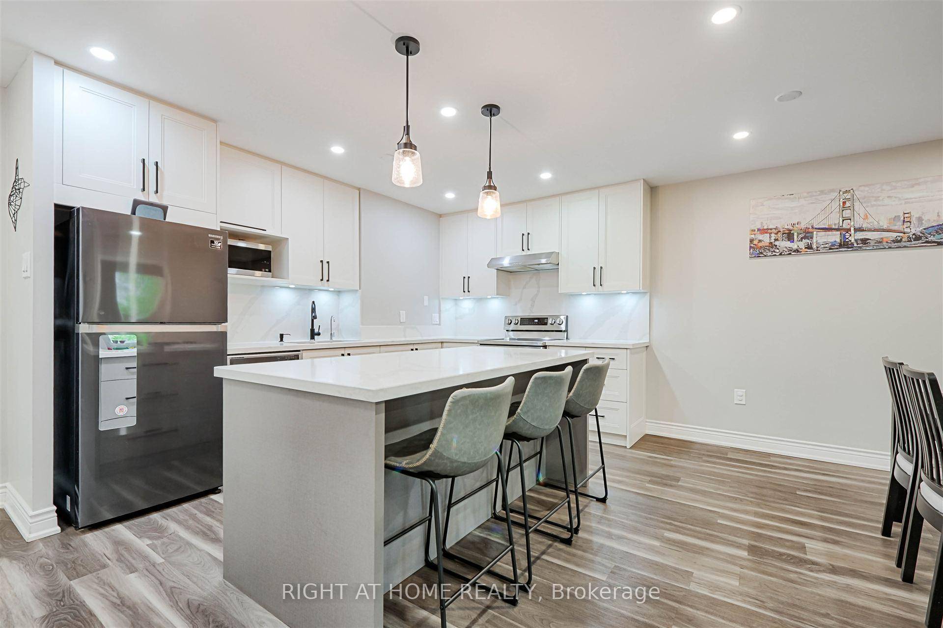 Newly Renovated with Private Patio, and TWO Parking Spots Welcome to this unique two storey condo built by Tridel, offering the perfect blend of space, style, and convenience.
