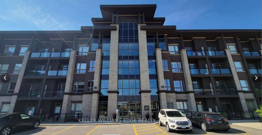 Rare Top Floor Penthouse at Vibe Condos Experience elevated living in this exceptional one bedroom plus den penthouse suite featuring soaring 10 foot ceilings and a bright, open concept layout.