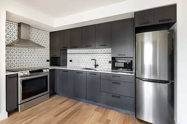 Stunning 1 bedroom, 1 bath residence featuring stainless steel appliances, in unit washer dryer, marble bathrooms, and spacious closets with open Western facing views.