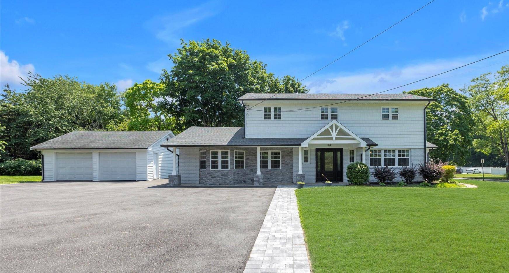 Step into this impeccably renovated 5br 3.