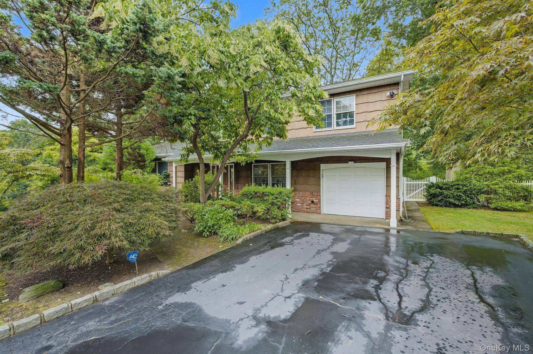 Welcome to 16 Delmar Lane, a beautiful Colonial in the famed Candy Section, set on a generous half acre property.