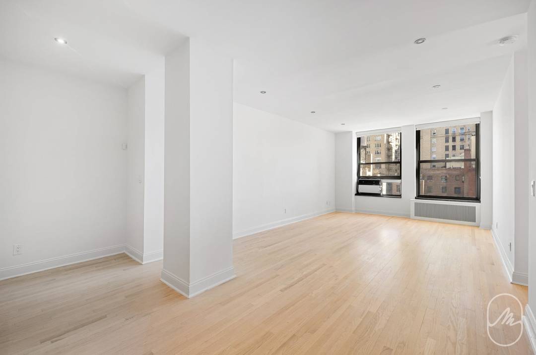Sprawling corner two bedroom, two bathroom loft now available at Gramercy Park Lofts.