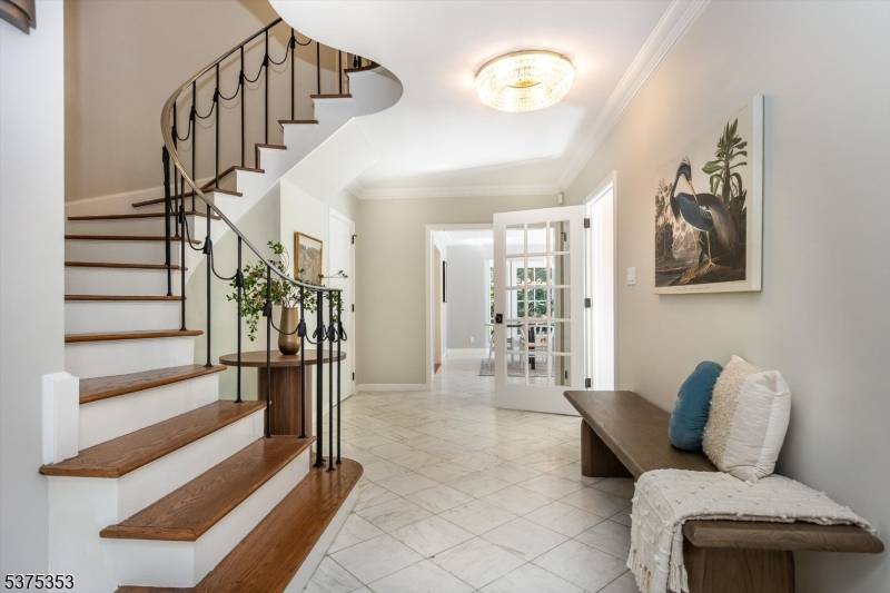 Experience refined living in this exceptional residence where timeless elegance meets modern design.