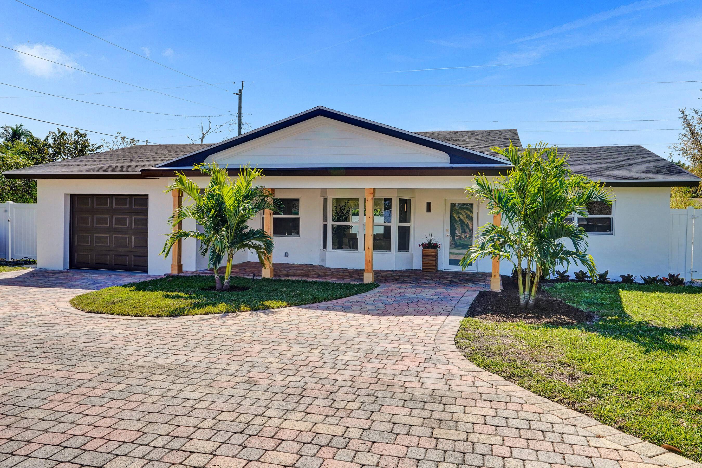 Beautifully remodeled 4 Bedroom, 3 Bath home in prime East Delray Beach location !