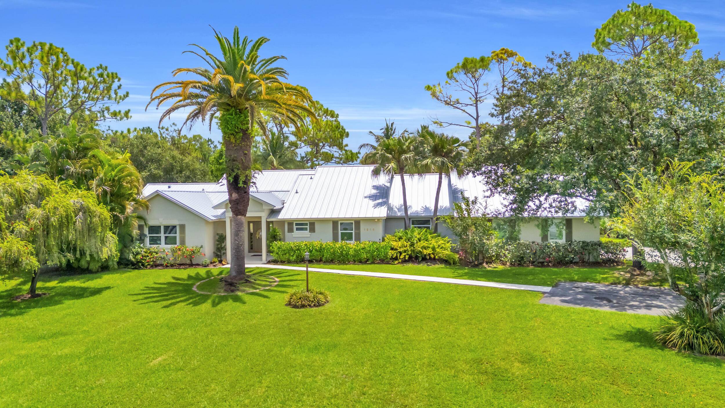 Jupiter's Best Value ! Over an acre in Ranch Colony, overlooking the 10th green of the Dye Preserve in a 24 hour guard gated community.