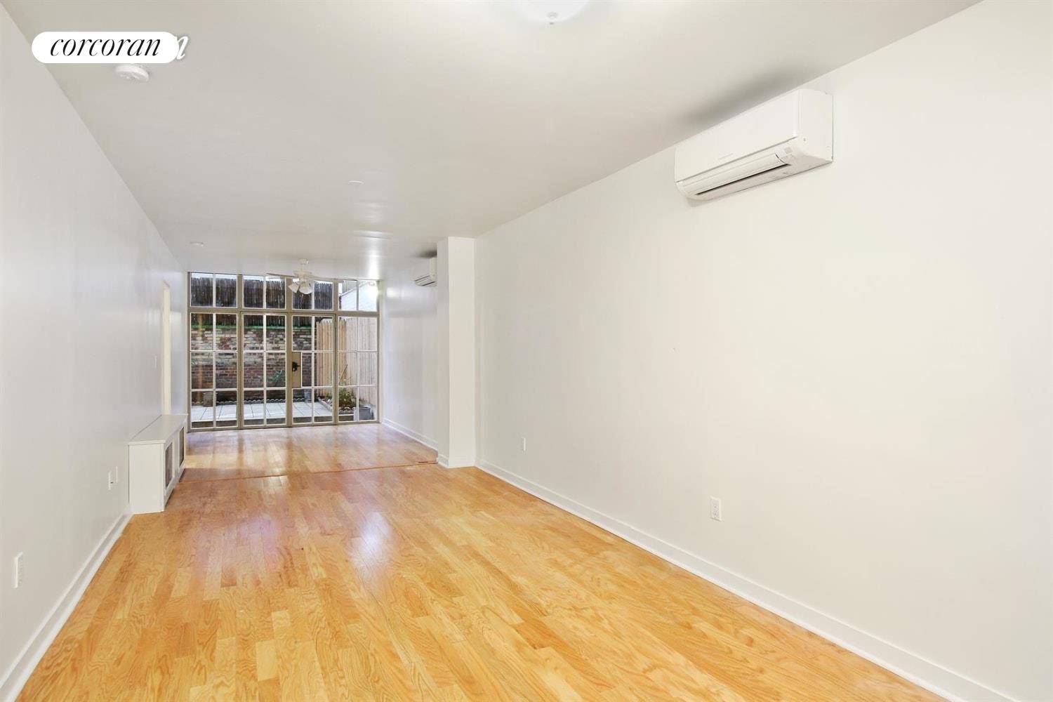 Exceptional 1000sf convertible 2 bedroom with a private garden in Prime West Village.