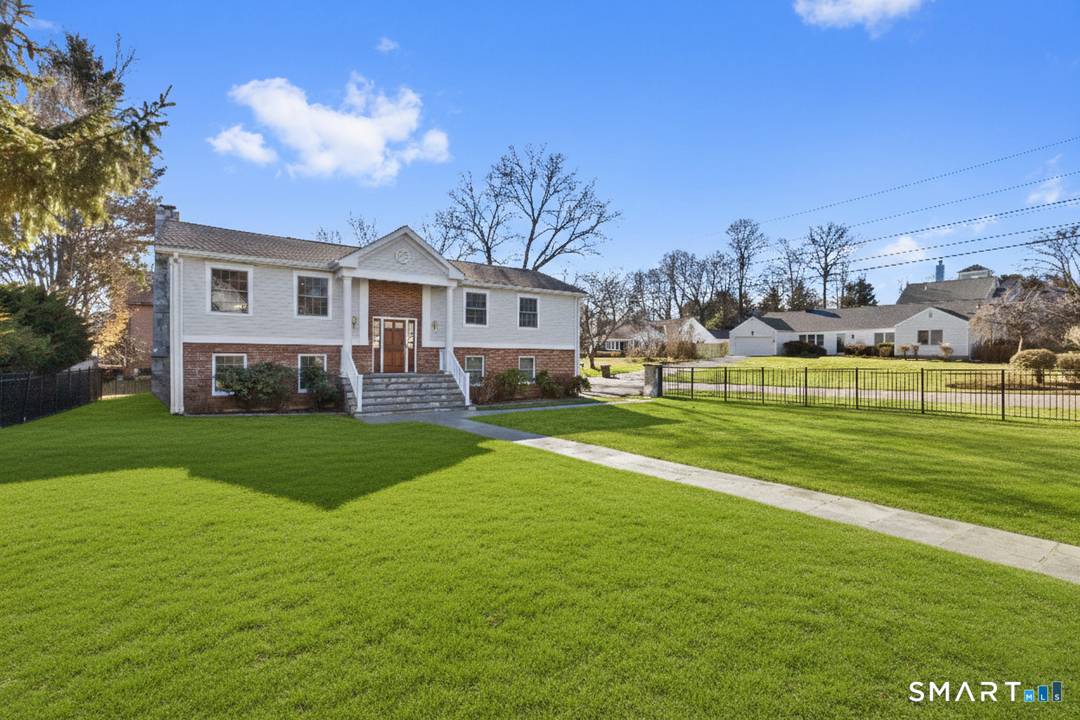 Set in Stamford's coveted Shippan Point waterfront community, this renovated home offers a flexible, livable layout.