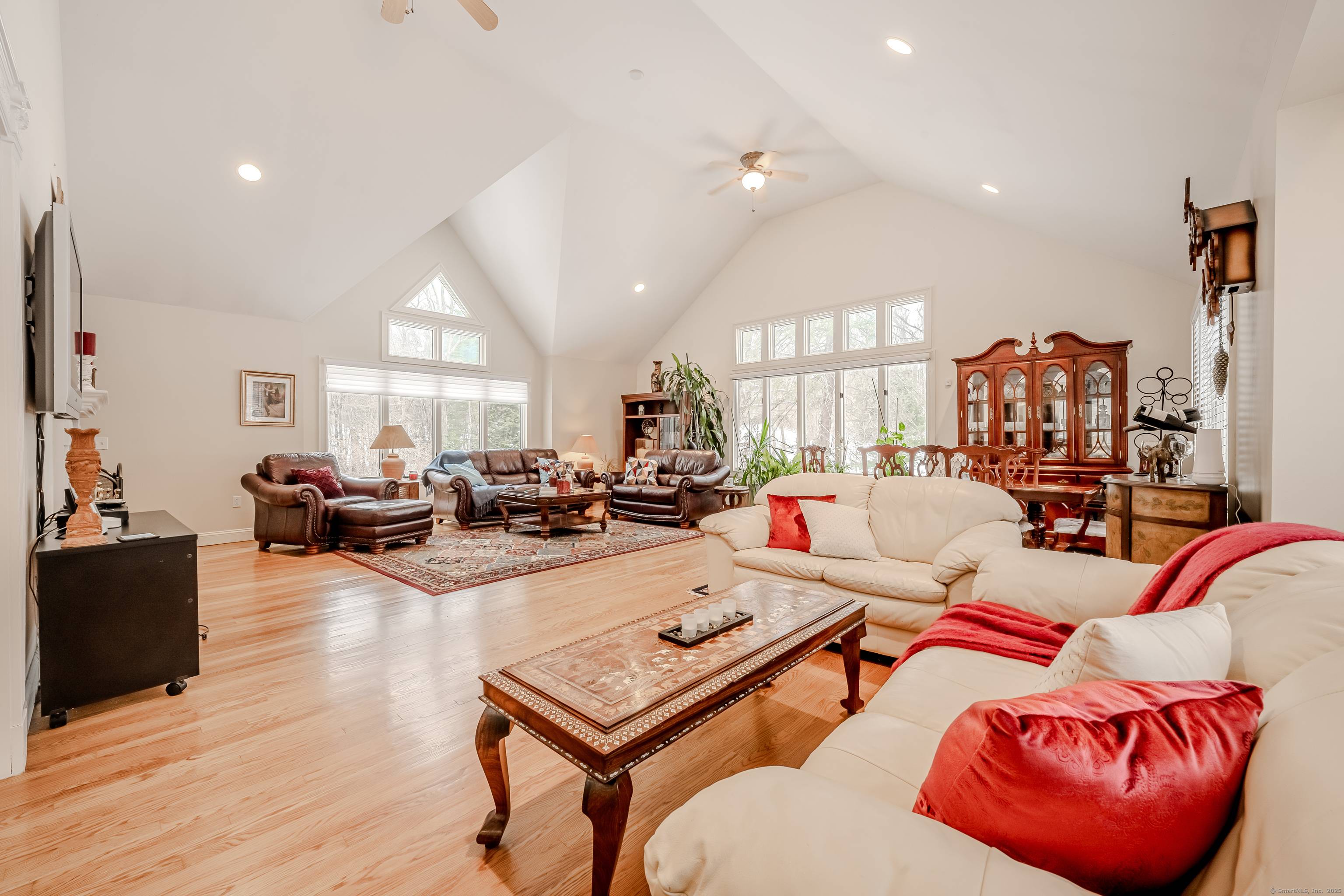 This stunning four bedroom Colonial with contemporary flair sits on 2.