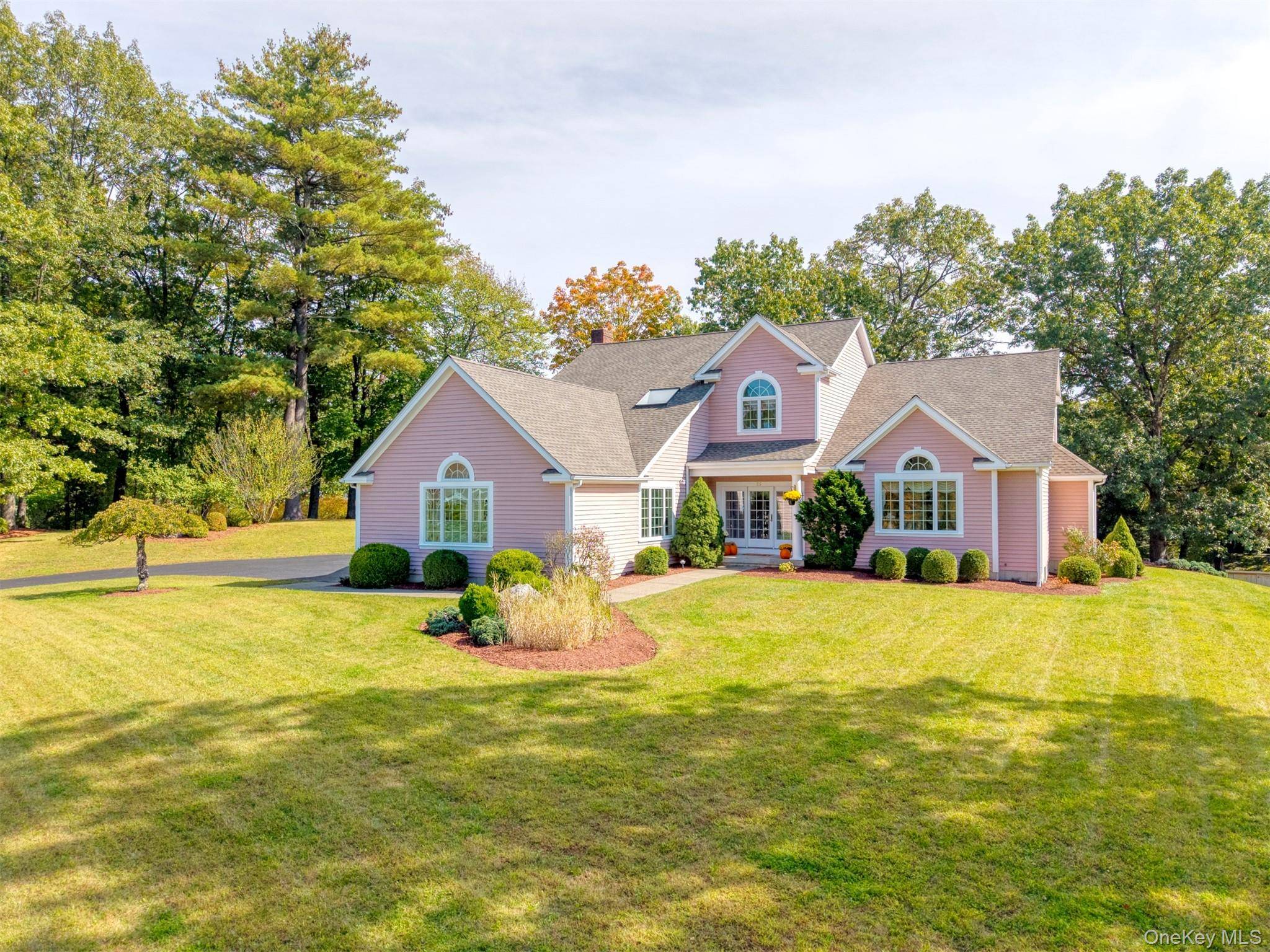Tucked away on a quiet cul de sac in Kingston's desirable Hillside Heights neighborhood, this custom built Contemporary offers an exceptional blend of style, space, and comfort.