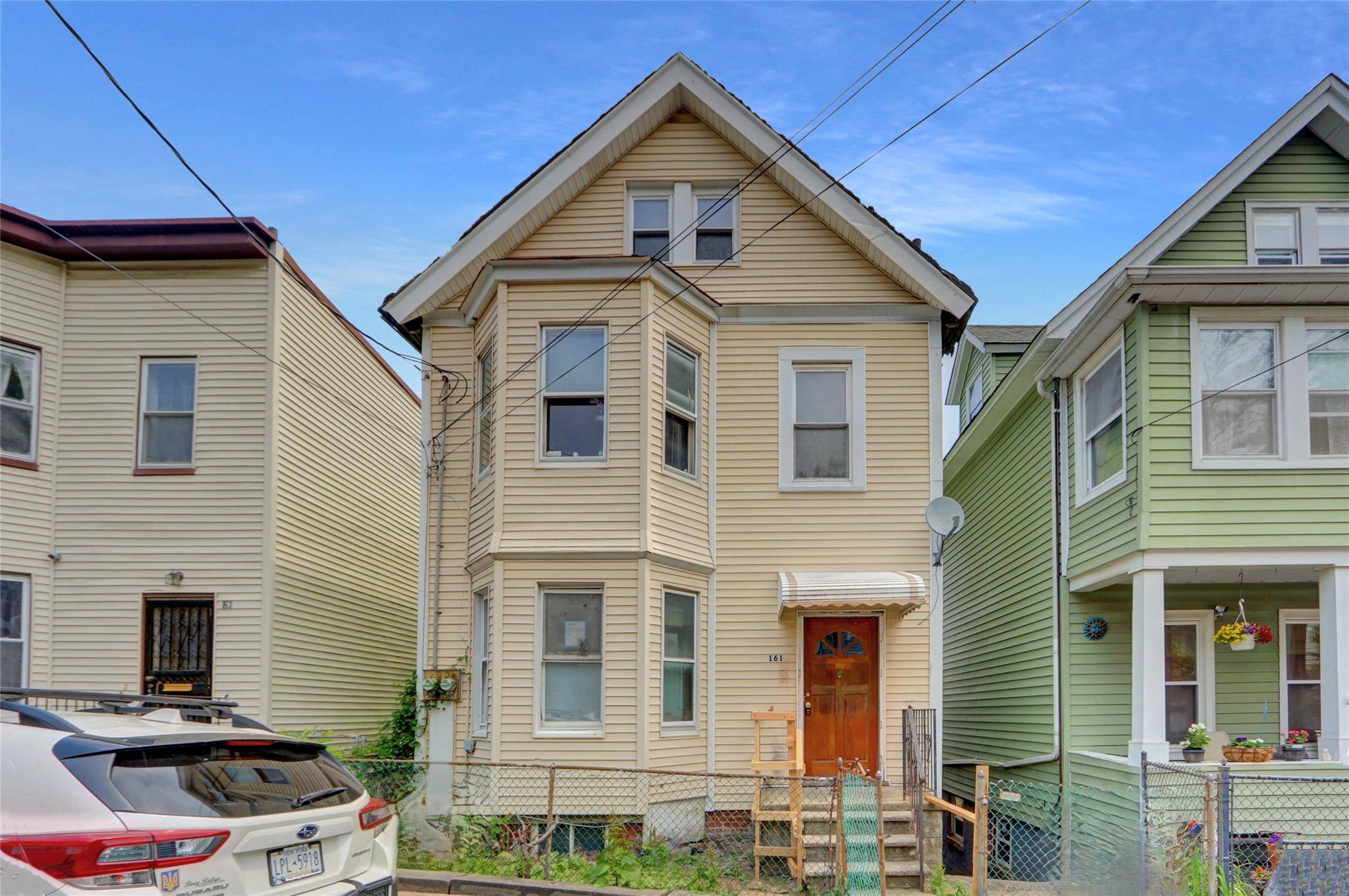Freestanding 2 Family, Colonial Style dwelling on dead end street, having plenty of yard space, full basement, versatile layout and exceptional potential.