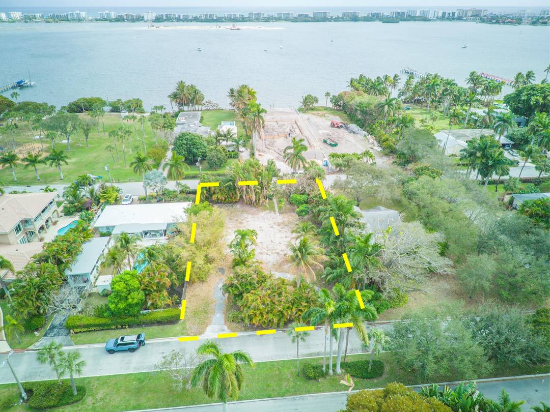 Incredible opportunity to build your dream home on a large lot running through from Palmway to Lakeside.