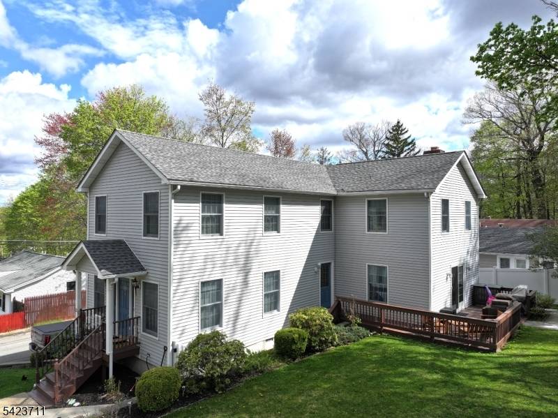 Welcome to this spacious Colonial nestled in the highly desirable Budd Lake area of Morris County, offering beautiful lake views and a lifestyle of comfort and convenience.