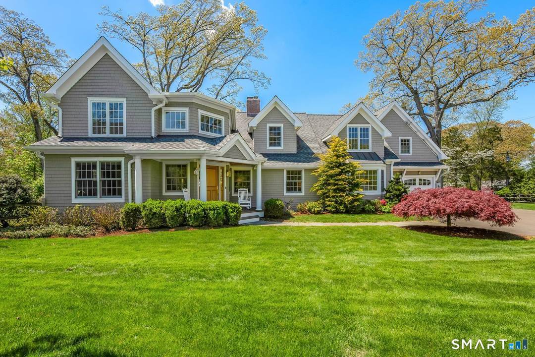 18 Phillips Lane offers a rare combination of neighborhood energy and privacy, set on one of Darien's most sought after cul de sacs.