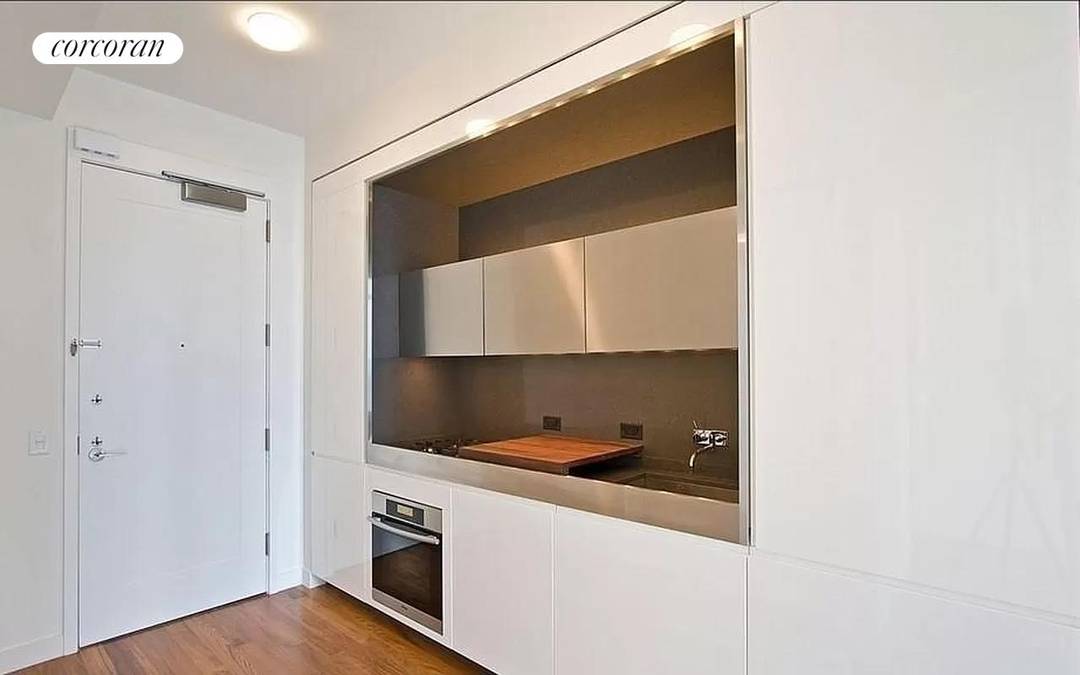 This modern designed alcove studio boasts 698 sq.