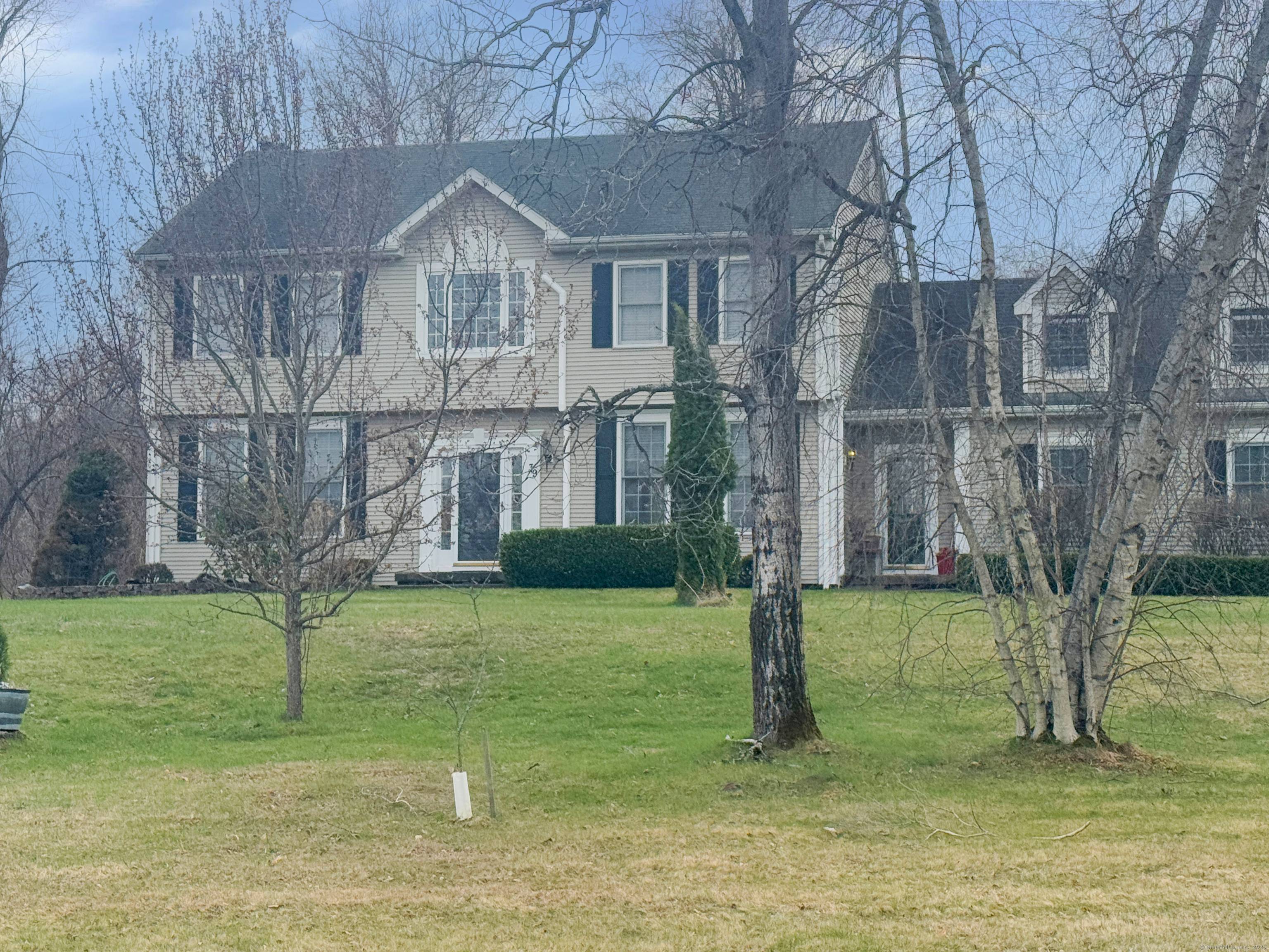 39 Ridge Blvd in East Granby is a charming Colonial nestled on a quiet street.