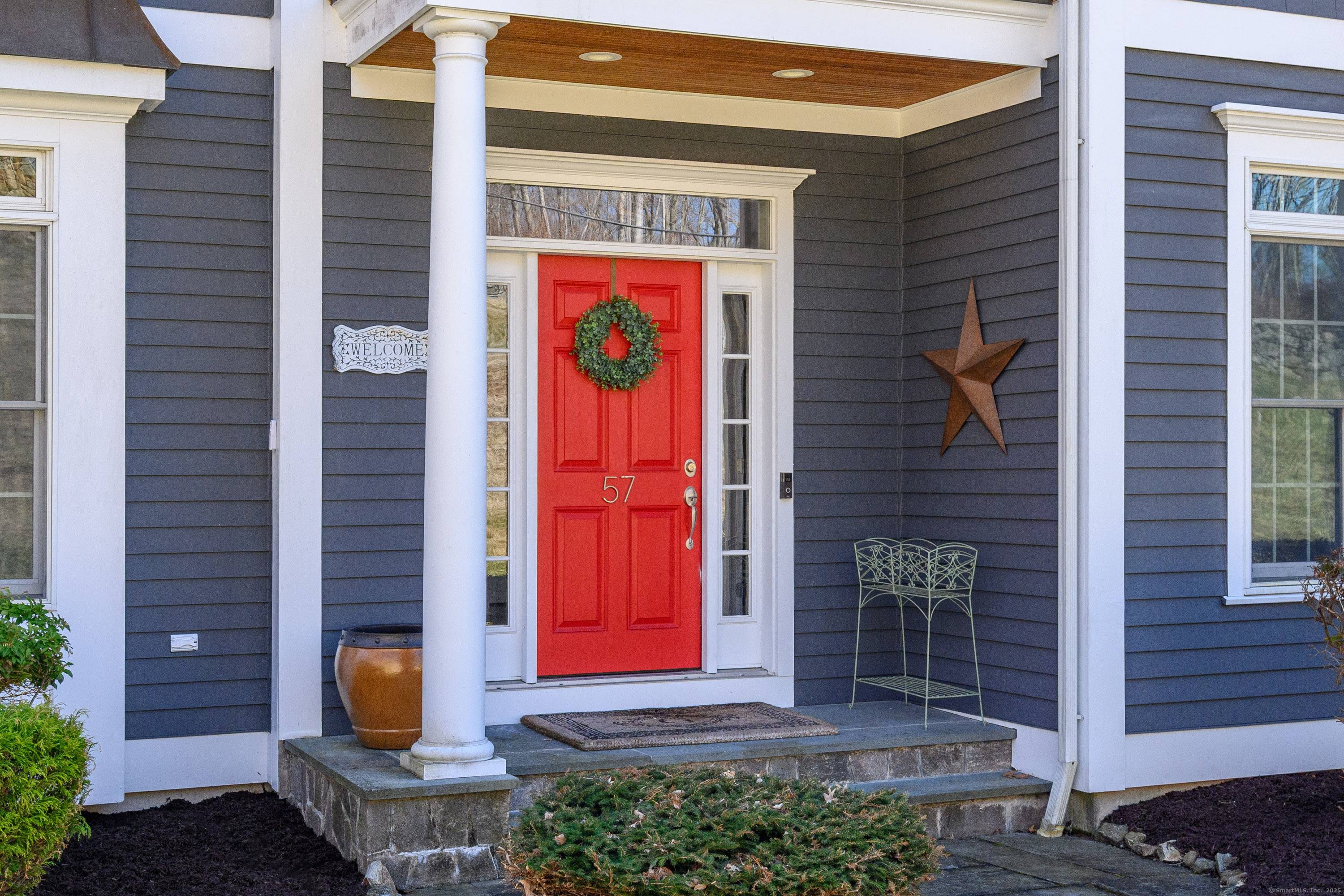 Welcome to 57 Castle Hill Road, a custom colonial ideally located just minutes from Newtown's historic town center.